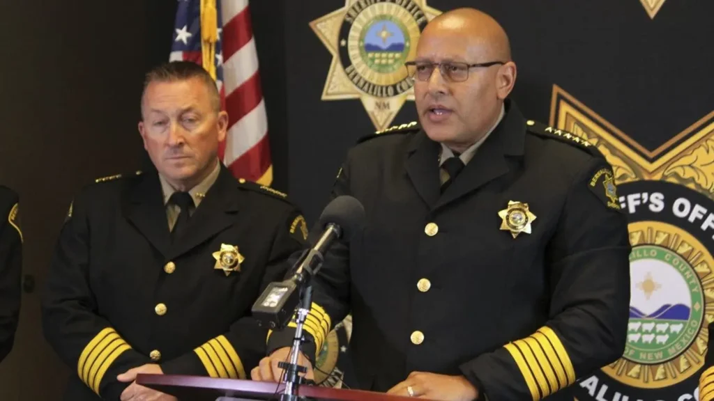 Bernalillo County Sheriff John Allen, right, is flanked by members of his leadership team as he calls New Mexico Gov. Michelle Lujan Grisham's order suspending the carrying of firearms in the state's most populous metropolitan area unconstitutional during a news conference in Albuquerque, New Mexico, on Monday, Sept. 11, 2023. Allen is among the other municipal law enforcement officials who have said they will not enforce the Democratic governor's order. (AP Photo/Susan Montoya Bryan)